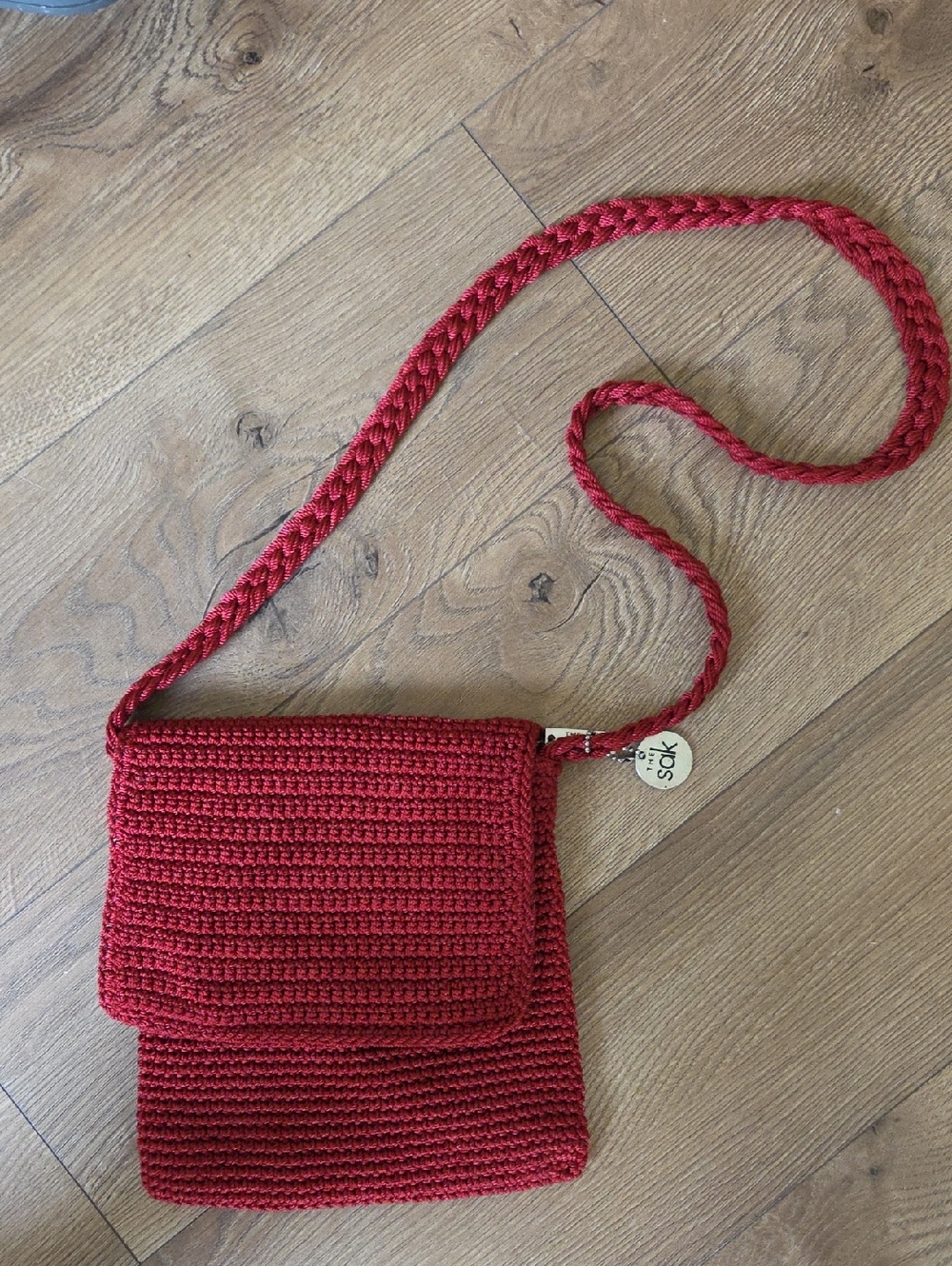 The Sak Deep Red Crochet Crossbody Bag with Braided Strap